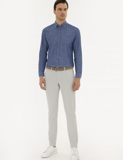 پیراهن آستین بلند مردانه یقه دکمه دار جیبدار ساده آبی نیلی کاشارل