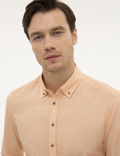 پیراهن آستین بلند مردانه یقه دکمه دار جیبدار ساده نارنجی کاشارل