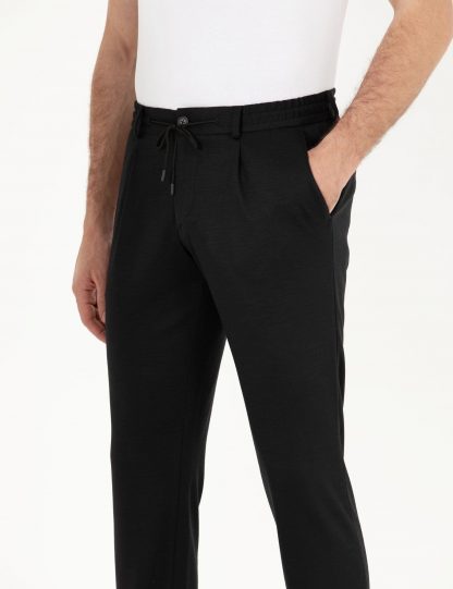 شلوار پارچه ای مردانه پشم جیبدار ساده سیاه کاشارل