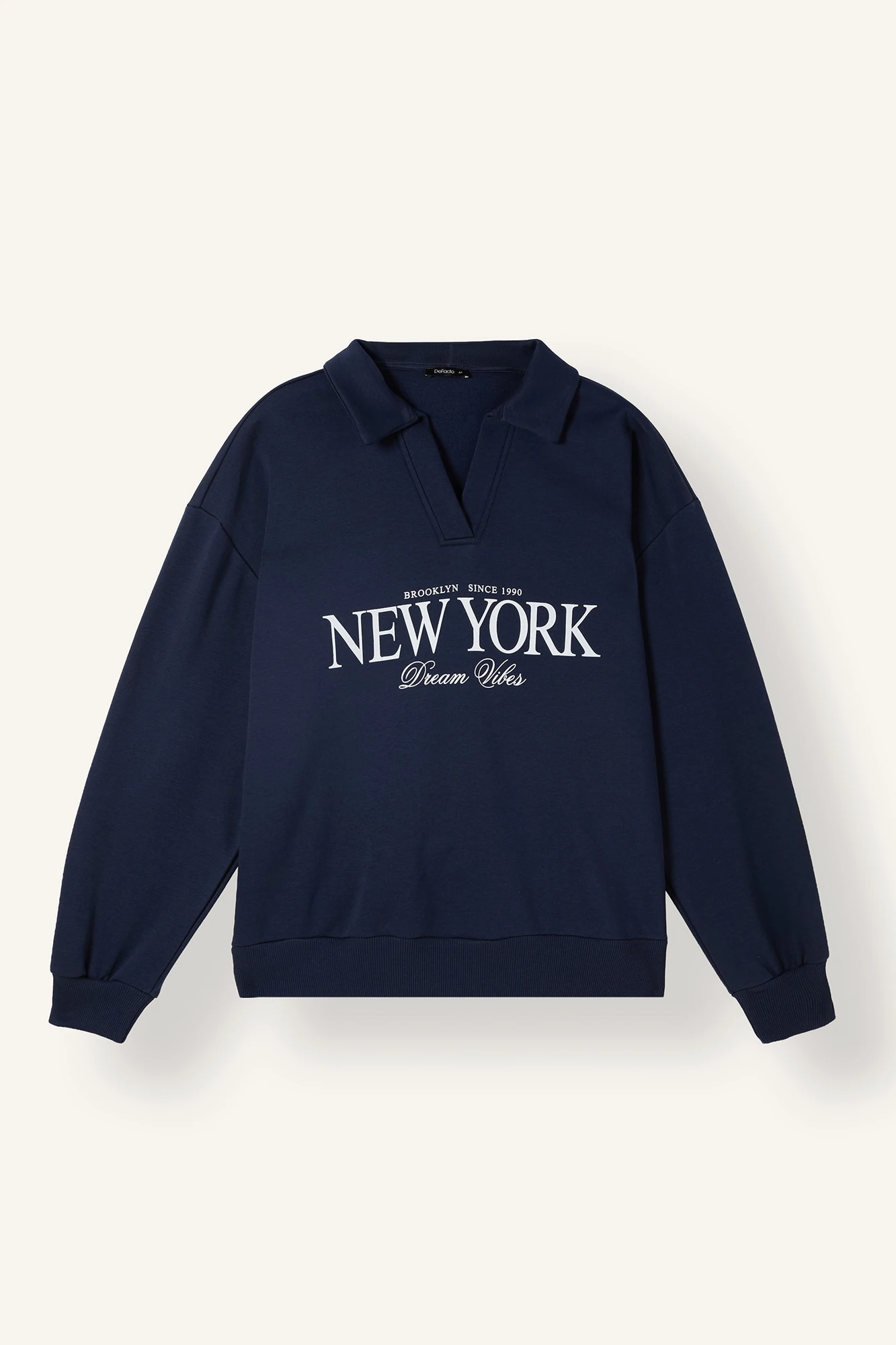 سویشرت یقه پولو زنانه دفکتو رنگ سرمهای طرح New York تصویر ۱